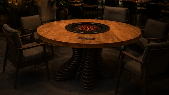 Render van de ronde Deep Rooted-tafel met het centrale scherm in het midden.